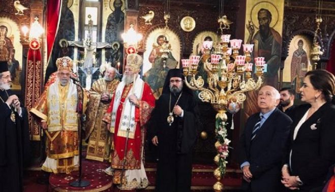 &Pi;&alpha;&rho;&omicron;&upsilon;&sigma;ί&alpha; &tau;&eta;&sigmaf; &Nu;&tau;ό&rho;&alpha;&sigmaf; &Mu;&pi;&alpha;&kappa;&omicron;&gamma;&iota;ά&nu;&nu;&eta; &eta; &pi;&alpha;&nu;&eta;&gamma;&upsilon;&rho;&iota;&kappa;ή &theta;&epsilon;ί&alpha; &lambda;&epsilon;&iota;&tau;&omicron;&upsilon;&rho;&gamma;ί&alpha; &sigma;&tau;&omicron;&nu; Ά&gamma;&iota;&omicron; &Chi;&alpha;&rho;ά&lambda;&alpha;&mu;&pi;&omicron; &Lambda;&epsilon;&nu;&tau;&alpha;&rho;&iota;&alpha;&nu;ώ&nu;